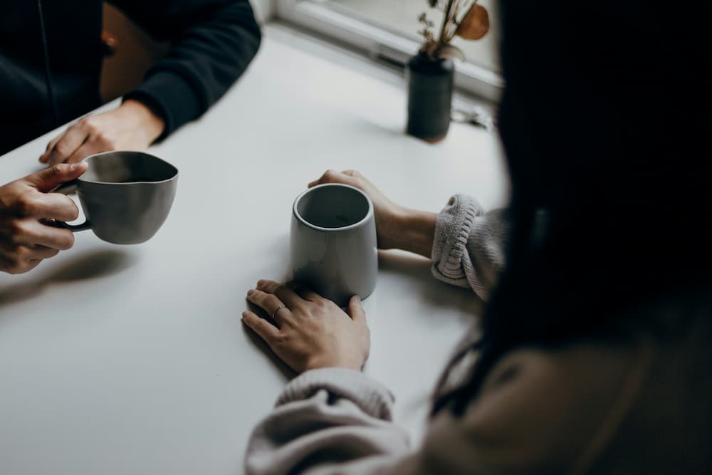 Having a chat over coffee